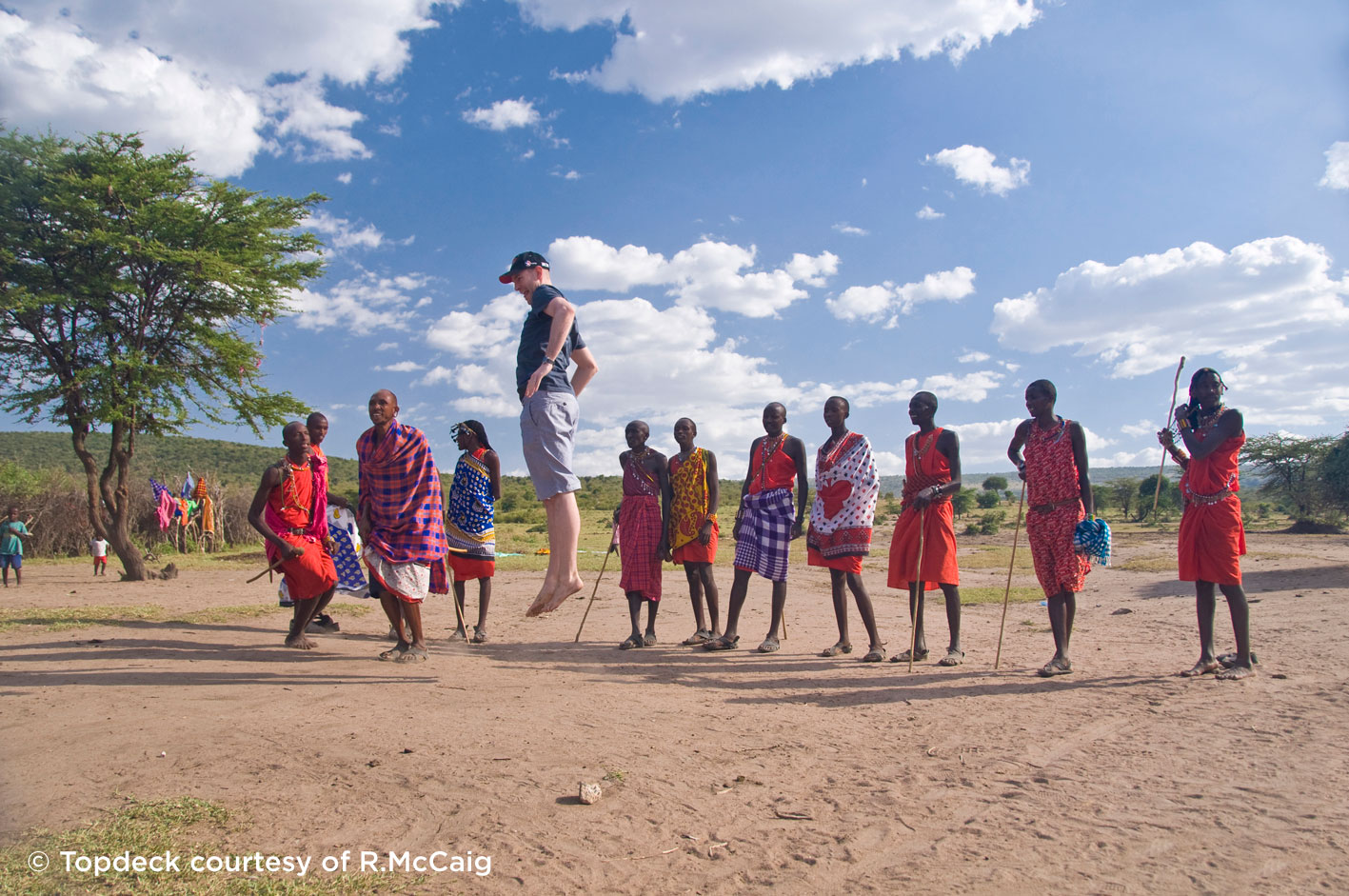 Image 6.	Jumping with the warriors: we visited a local Maasai village where the people live in the traditional way, in mud huts and herding cows and goats. The men did a performance for us, singing us their traditional songs and invited the other guys from our group to jump with them.