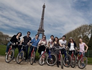 Cycling around the Eiffel Tower on California Beach Cruisers.